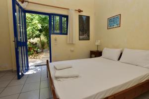 Postel nebo postele na pokoji v ubytování Anonymous Homestay