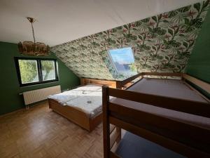 Postel nebo postele na pokoji v ubytování Bärenheim