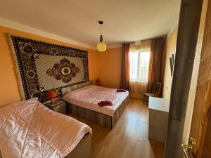 Postel nebo postele na pokoji v ubytování guesthouse gareji