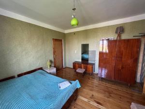 Postel nebo postele na pokoji v ubytování guesthouse gareji