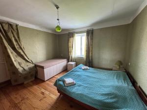 Postel nebo postele na pokoji v ubytování guesthouse gareji