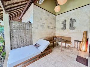 Ένα ή περισσότερα κρεβάτια σε δωμάτιο στο Karmagali Suites Adults only & Private Pool Family Villas