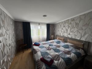 Postel nebo postele na pokoji v ubytování guesthouse gareji