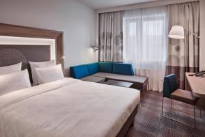 Postel nebo postele na pokoji v ubytování Four Points Flex by Sheraton Östringen