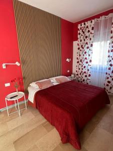 Postel nebo postele na pokoji v ubytování Casa Mammì