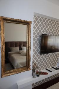 Cama o camas de una habitación en VERA apartman