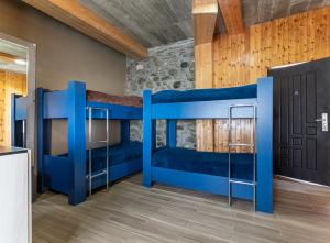Letto o letti in una camera di Manoni Ratiani's Guesthouse