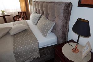 Cama o camas de una habitación en VERA apartman