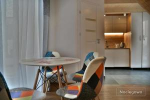 Kuchyň nebo kuchyňský kout v ubytování Domek Apartament Marynarski z kominkiem