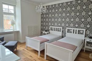 Katil atau katil-katil dalam bilik di Villa 18