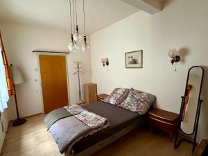 Postel nebo postele na pokoji v ubytování Goldner Stern Kaub