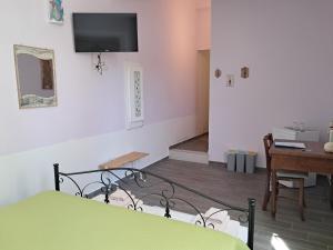 TV a/nebo společenská místnost v ubytování La casa di Aneupe