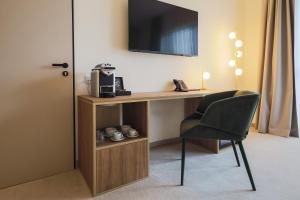 TV o dispositivi per l'intrattenimento presso Hotel Essence
