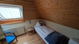 Postelja oz. postelje v sobi nastanitve Hotel Harder Minerva