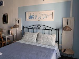 Postel nebo postele na pokoji v ubytování La casa di Aneupe