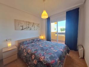 A bed or beds in a room at Lomas del Mar 5 Bajo