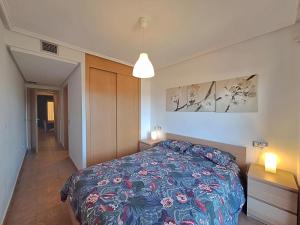 A bed or beds in a room at Lomas del Mar 5 Bajo