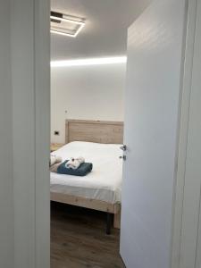 Postel nebo postele na pokoji v ubytování Domus Laita
