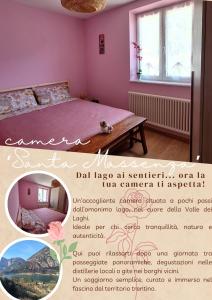 Postel nebo postele na pokoji v ubytování Casa 'Rosa dei laghi'