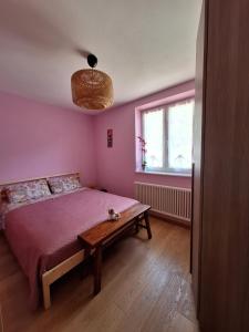 Postel nebo postele na pokoji v ubytování Casa 'Rosa dei laghi' + 5 fotografií