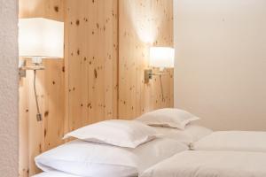 Katil atau katil-katil dalam bilik di Hotel Gurglhof Superior