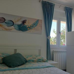 Postel nebo postele na pokoji v ubytování Casa vacanze Arcobaleno + 63 fotografií