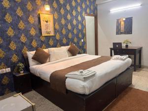 Postel nebo postele na pokoji v ubytování Hotel Stay 49 - Near Apollo Hospital
