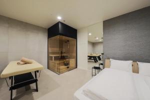 Letto o letti in una camera di Hotel Essence