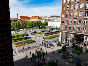 a group of people walking around a city street at Feel Home CENTRAL SUPERIOR # AC # Elevator in Budapest