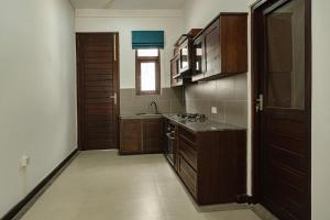 Kuchyň nebo kuchyňský kout v ubytování Sithmi Homes + 17 fotografií