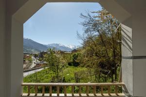 a view from the balcony of a house at Aosta Green Apartment - Mountain View & Parking in Aosta
