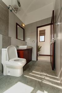 Koupelna v ubytování Sithmi Homes