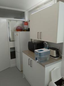 Köök või kööginurk majutusasutuses Double room in a cosy flat in Tooting