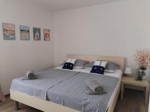 Postel nebo postele na pokoji v ubytování Family apartment B&B