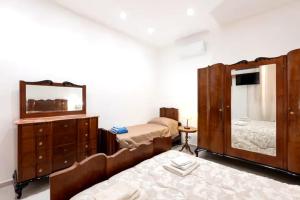 Ένα ή περισσότερα κρεβάτια σε δωμάτιο στο Casa Vacanza Desy
