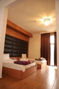 Ένα ή περισσότερα κρεβάτια σε δωμάτιο στο فندق الخيال الكبير +23 φωτογραφίες