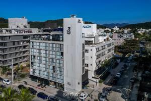 an aerial view of a building in a city at Spot Jurere sophistication by the sea - SPJ's in Florianópolis