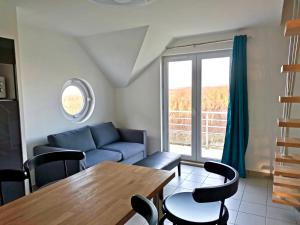 Posezení v ubytování Entre mer et dunes d'Opale - duplex vue mer
