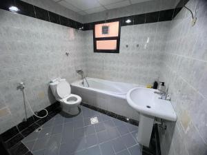 Koupelna v ubytování Al Ain Host