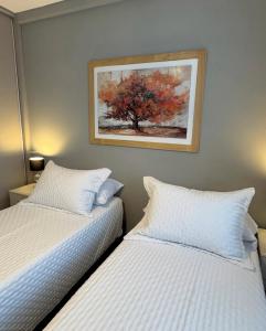 Pamparelax25客房内的一张或多张床位