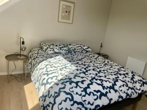 Postel nebo postele na pokoji v ubytování Entre mer et dunes d'Opale - duplex vue mer + 20 fotografií