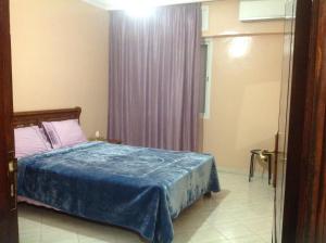 Krevet ili kreveti u jedinici u objektu Location Mohammedia Mannesman Plages