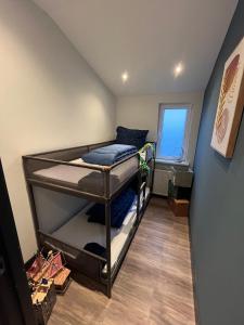 Postel nebo postele na pokoji v ubytování Bungalowpark de Horn - 821