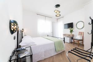 Łóżko lub łóżka w pokoju w obiekcie B&B Palazzo Pinto 2