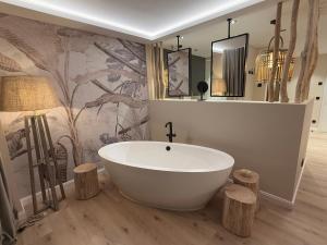 Koupelna v ubytování Das Oswald's Boutique Hotel