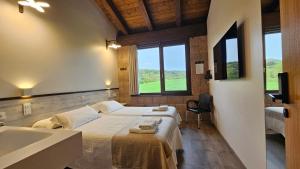 TV a/nebo společenská místnost v ubytování Casa Nahia Hostal Rural