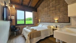 Postel nebo postele na pokoji v ubytování Casa Nahia Hostal Rural