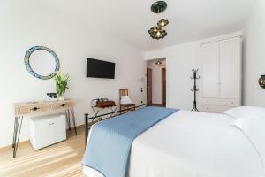 Łóżko lub łóżka w pokoju w obiekcie B&B Palazzo Pinto 2
