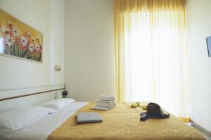 Кровать или кровати в номере Hotel Reyt