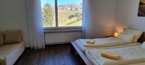 Postel nebo postele na pokoji v ubytování BellaRosa + 37 fotografií